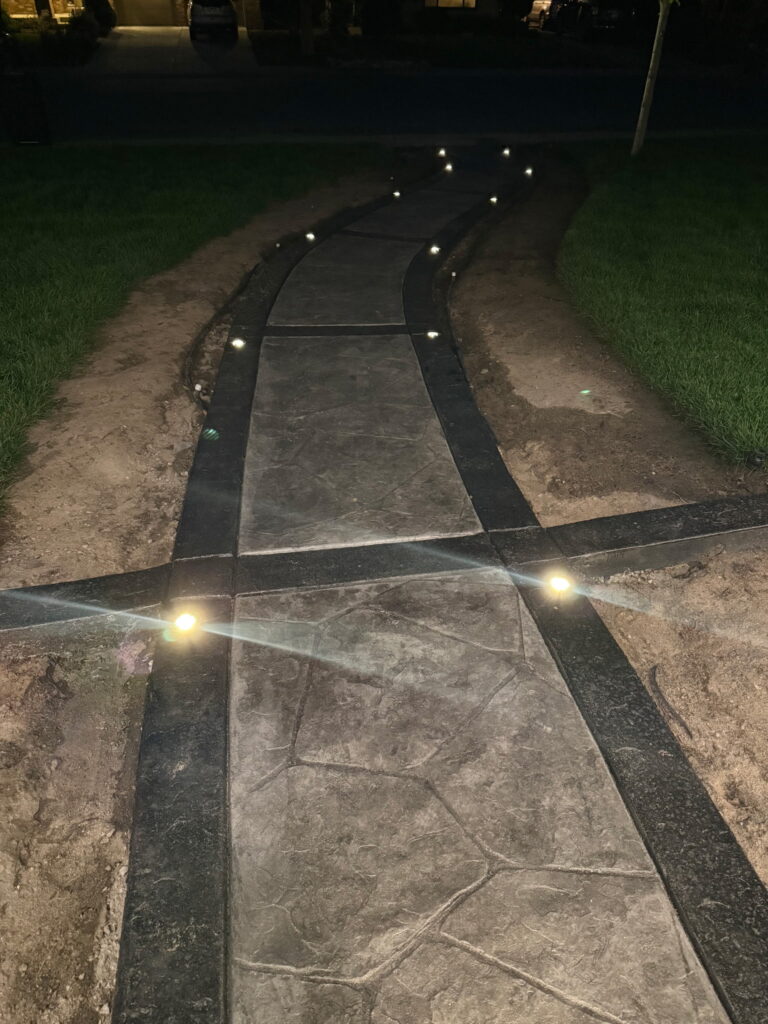 Lit Concrete Walkway