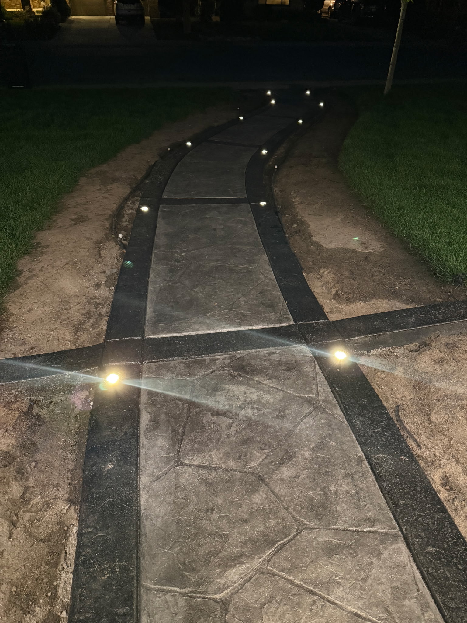 Lit Concrete Walkway